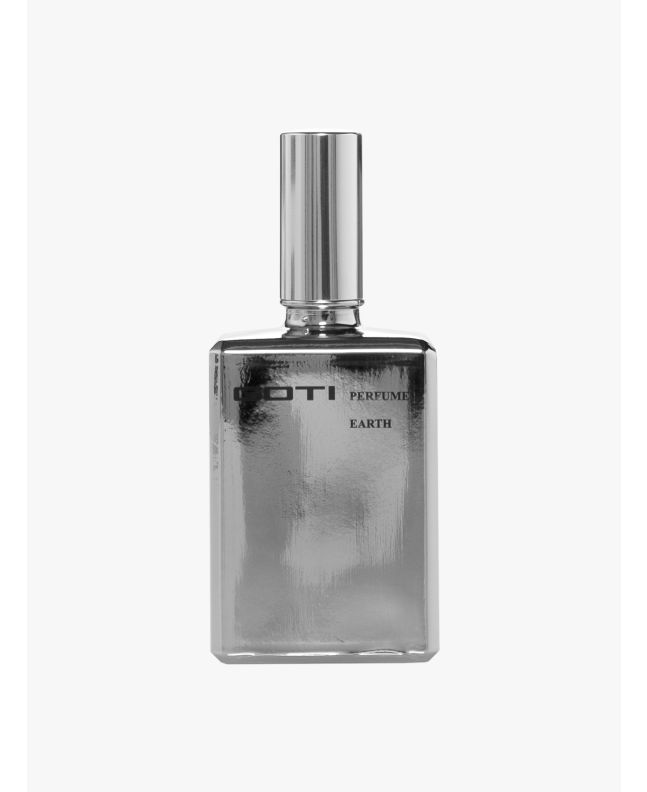 Front of the silver-tone glass bottle of Goti Earth perfume.