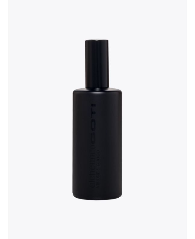Front view of the black glass bottle of Goti Alchemico Fuoco parfum.