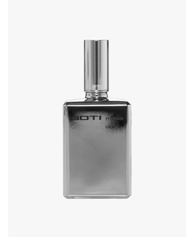 Front view of the silver-tone glass bottle of Goti Gray perfume.