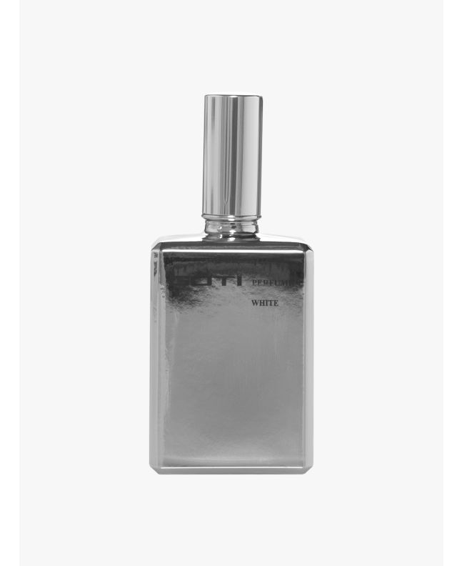 Front view of the silver-tone glass bottle of Goti White perfume.