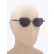 Kuboraum Mask P58 Frameless Cat-Eye Sunglasses Black with mannequin three-quarter right view