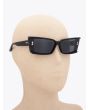 Akoni Lynx Cat-Eye Black Sunglasses with mannequin three-quarter view