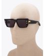 Balmain B-VI Square-Frame Black/Gold-Tone Sunglasses with mannequin three-quarter left view