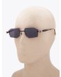 Kuboraum Mask P55 Frameless Rectangle Sunglasses Black with mannequin three-quarter left view