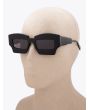 Kuboraum Mask X6 Cat-Eye Sunglasses Black Shine with mannequin three-quarter left view