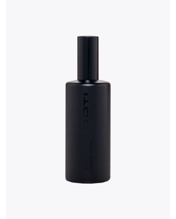 Front view of the black glass bottle of Goti Alchemico Aria parfum.