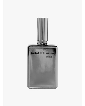 Front of the silver-tone glass bottle of Goti Smoke perfume.